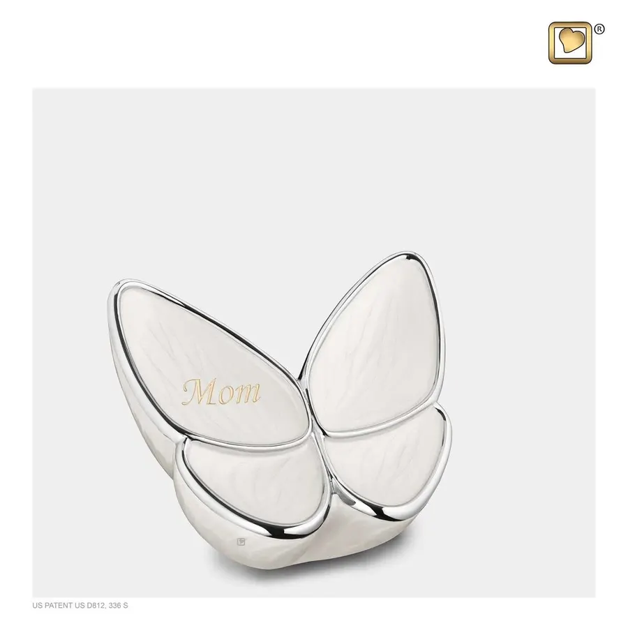 witte urn met gravure