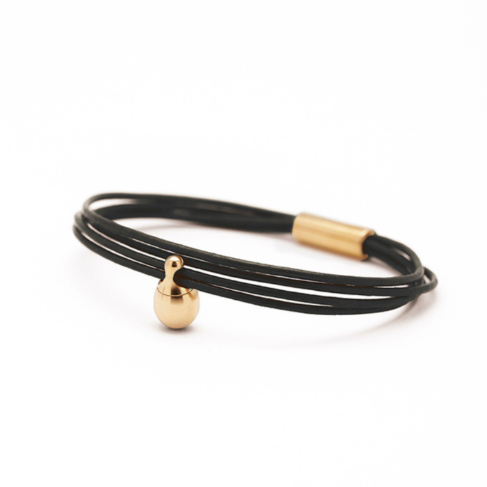 Armband - Zwarte Charm - goud